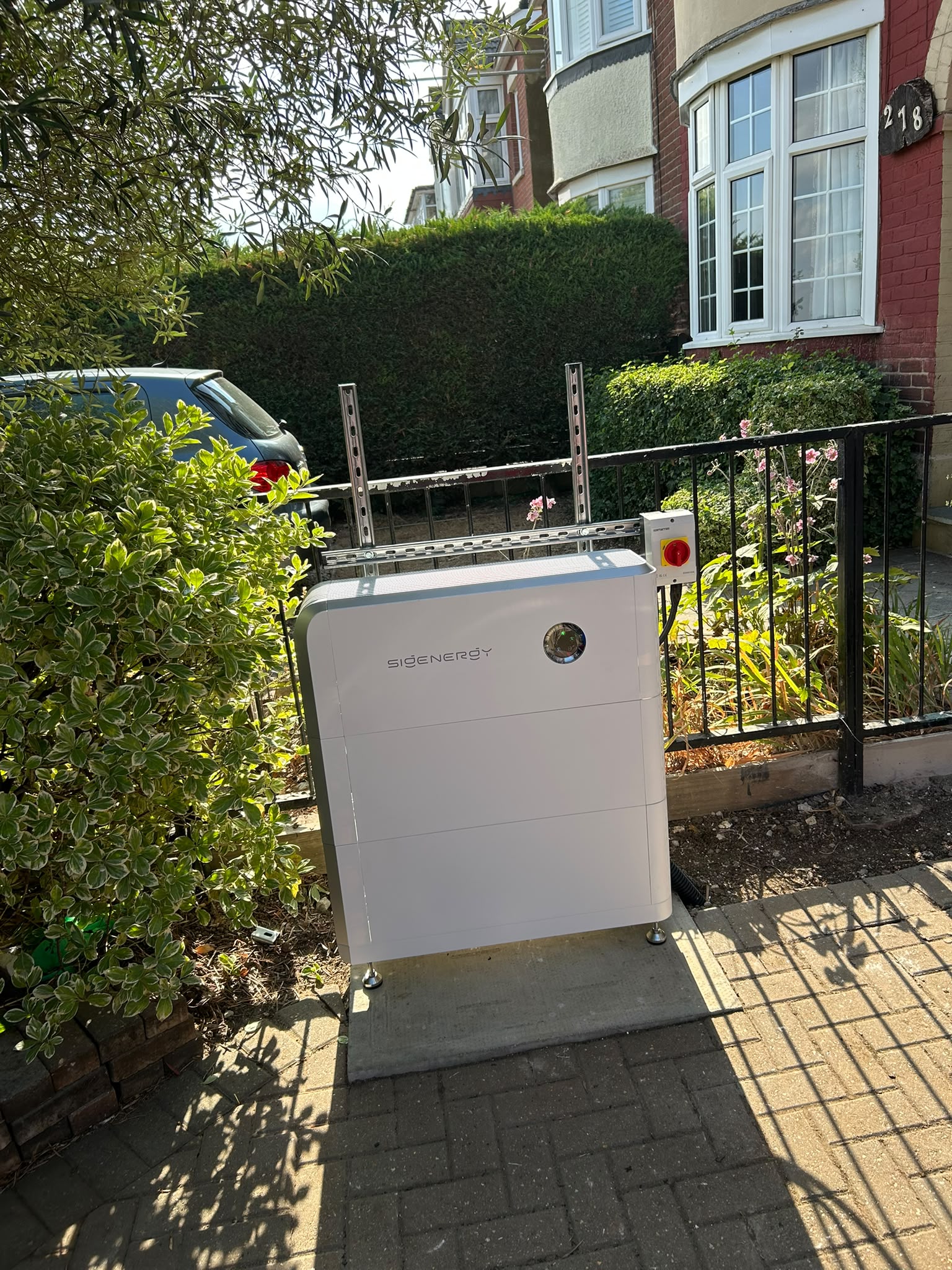 SigenStor at a Kent property. An outdoor battery installation. Location and system design are assessed for each property.
